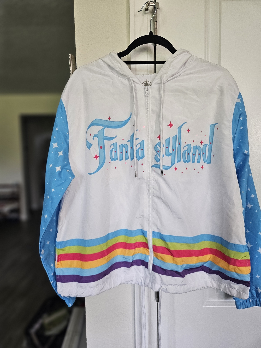 LG Adult Fantasyland White Hooded Windbreaker with Blue Sleeves and Rainbow